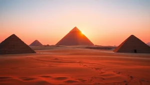 Pyraminds illuminated at sunset, highlighting their grandeur and historical significance.