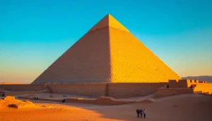 Discover the majestic piraminds of Giza towering against a sunset sky.