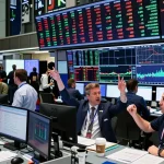 Traders monitoring stock market indices live in a vibrant trading floor atmosphere.